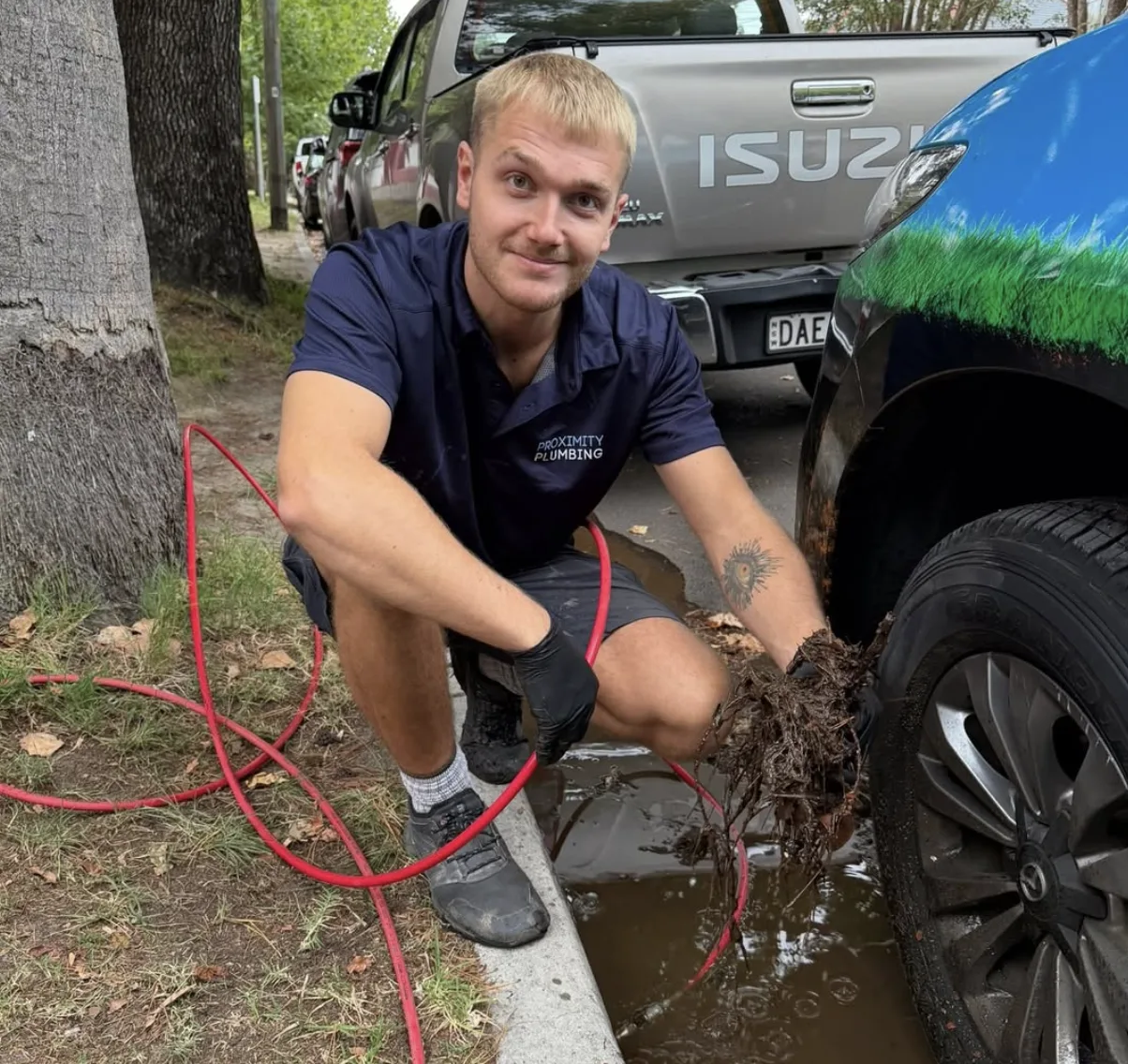 Tree roots cleared from a drain, loaded at the ute